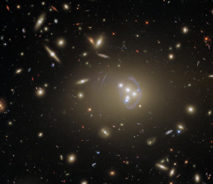 In this detailed image is Abell 3827, a group of galaxies that offers plenty of exciting opportunities to study.  Hubble discovered it to study dark matter, one of the biggest puzzles for cosmologists today.