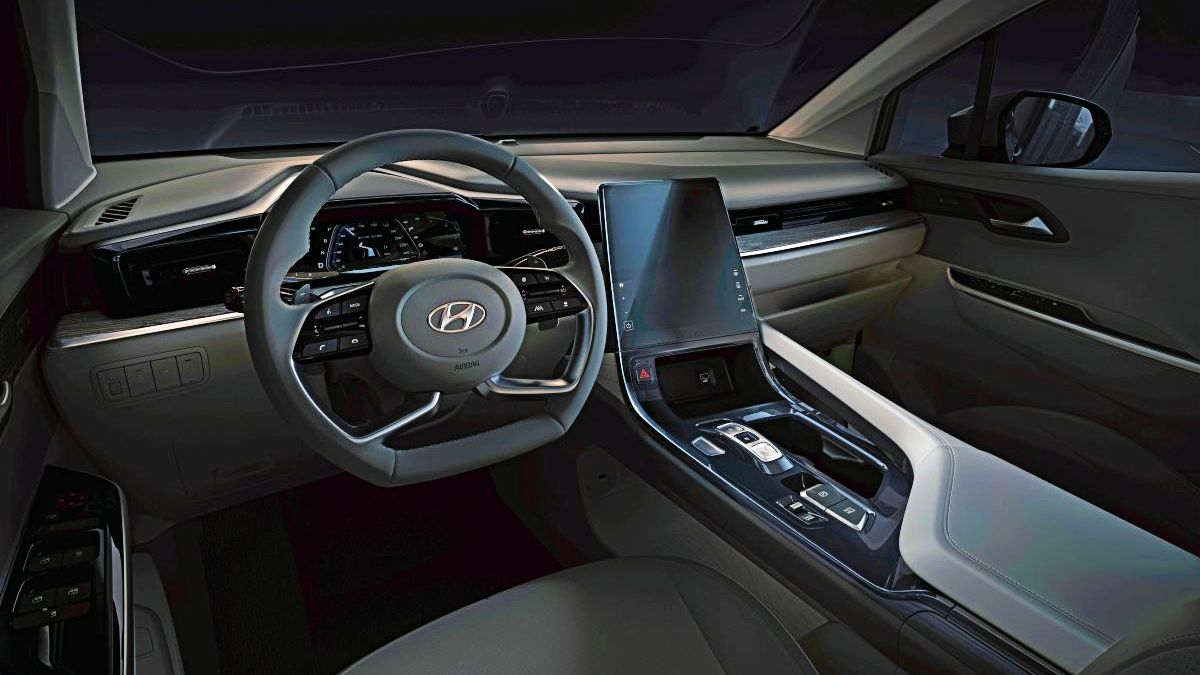 The Creta-style steering wheel and vertical 10.4-inch touch screen stand out from inside the Custon.  Photo: Hyundai
