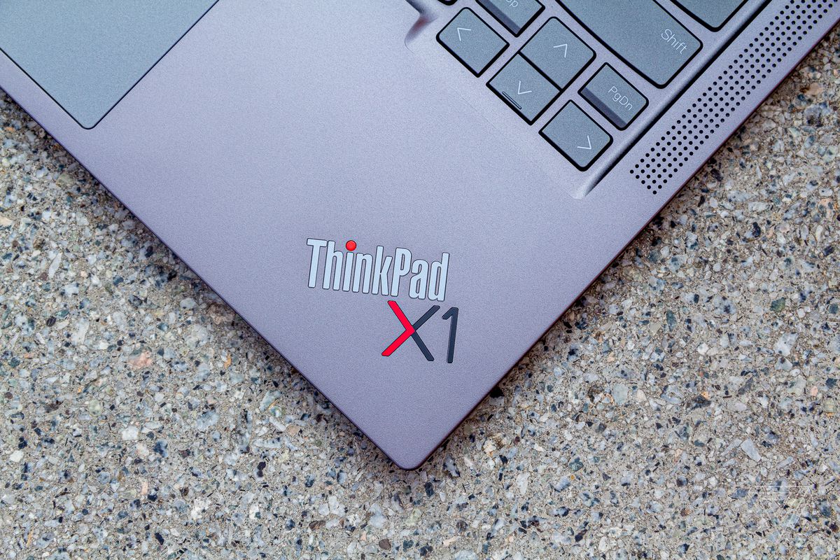 ThinkPad X1 logo ThinkPad X1 in Yoga Gen 6 seen from above on a stone table.