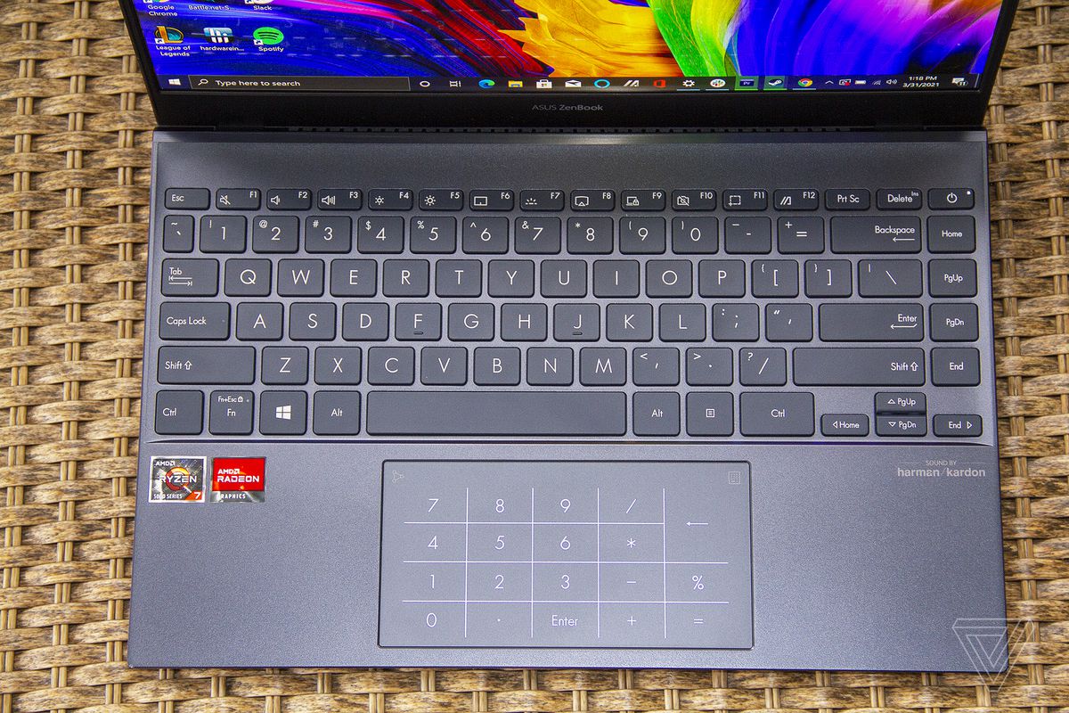 Asus Zenbook 13 OLED keyboard seen from above.  The display shows the LED numeric keypad.