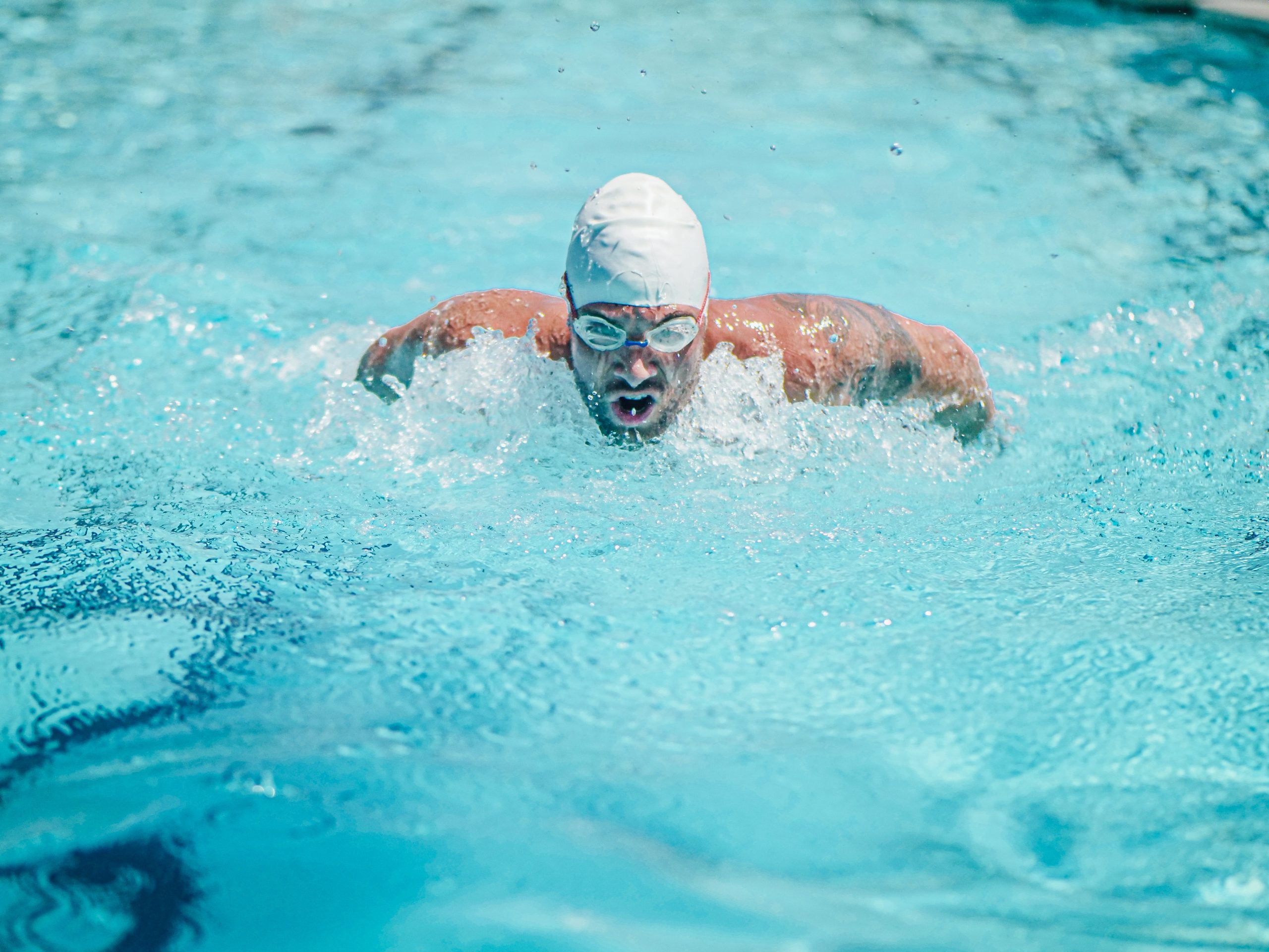 How to Swim Like a Pro and Look Good Doing It - Tips and Tricks from a Successful Swimmer!